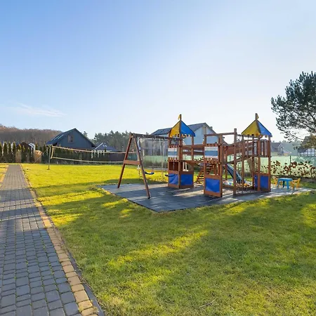 Apartment Caloroczne Drewniane W Urokliwej Okolicy By Renters Grzybowo (West Pomeranian)